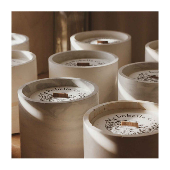 A beautiful botanical soy wax candle in the fragrance 'Sea Salt &  Driftwood'. Hand poured in small batches in the North East of England.