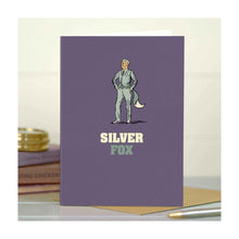  A bold, quirky illustrated card by The Typecast Gallery. It features a vintage-style illustration of a man in silver with a fox tail, above the words "Silver Fox". It's like sending a cheeky wink.&nbsp;