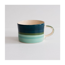  A colourful handcrafted mug from Musango in their Tundra tri-colour glaze. 