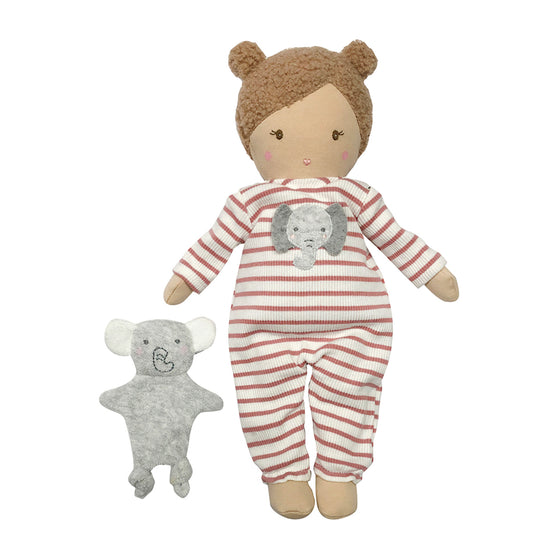 A super soft cotton doll. Eli wears a red and white striped babygro, has blonde boucle hair in buns and holds a little Elephant friend.