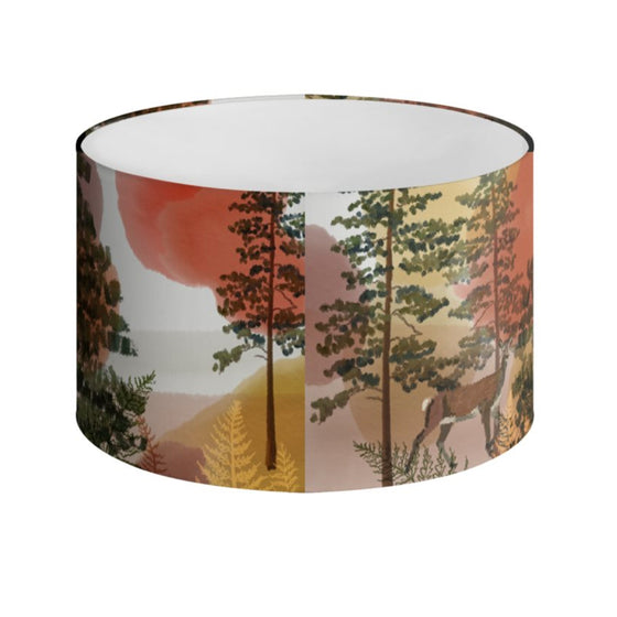An illustrated lampshade featuring a woodland scene with stags by Tori Gray / Harbour Lane Studio