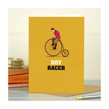  A bold, quirky illustrated card by The Typecast Gallery. It features a vintage-style illustration of a man on a penny farthing, above the words "Boy Racer". Is there a man in your life who loves bikes? This is the card for him.&nbsp;