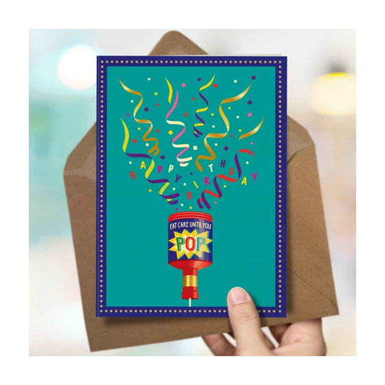 A bold, delightfully illustrated birthday card by The Typecast Gallery. It features a party popper with the words "Happy Birthday, Eat Cake Until you Pop" in the streamers and on the label. The perfect birthday greeting.&nbsp;