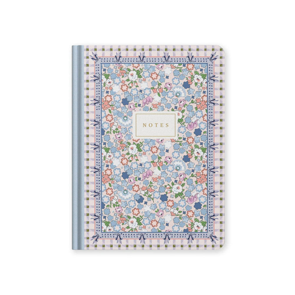 Floral patterned notebook with 'Notes' text on a white background