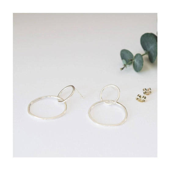 Double Circle Drop Earrings from MUKA Jewellery. Made from recycled sterling silver.