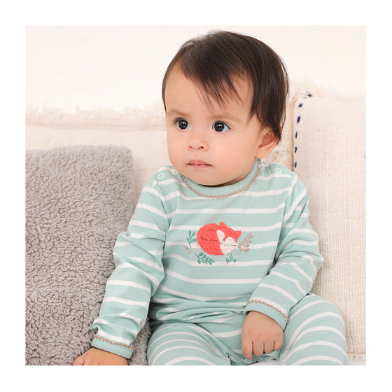 A handcrafted babygro in a light green and white stripe with embroidered fox detailing on the chest.