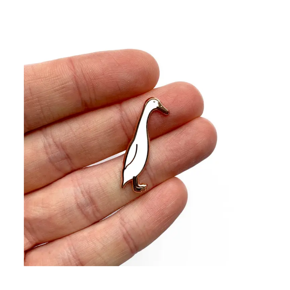 
                  
                    Runner Duck Enamel Pin
                  
                