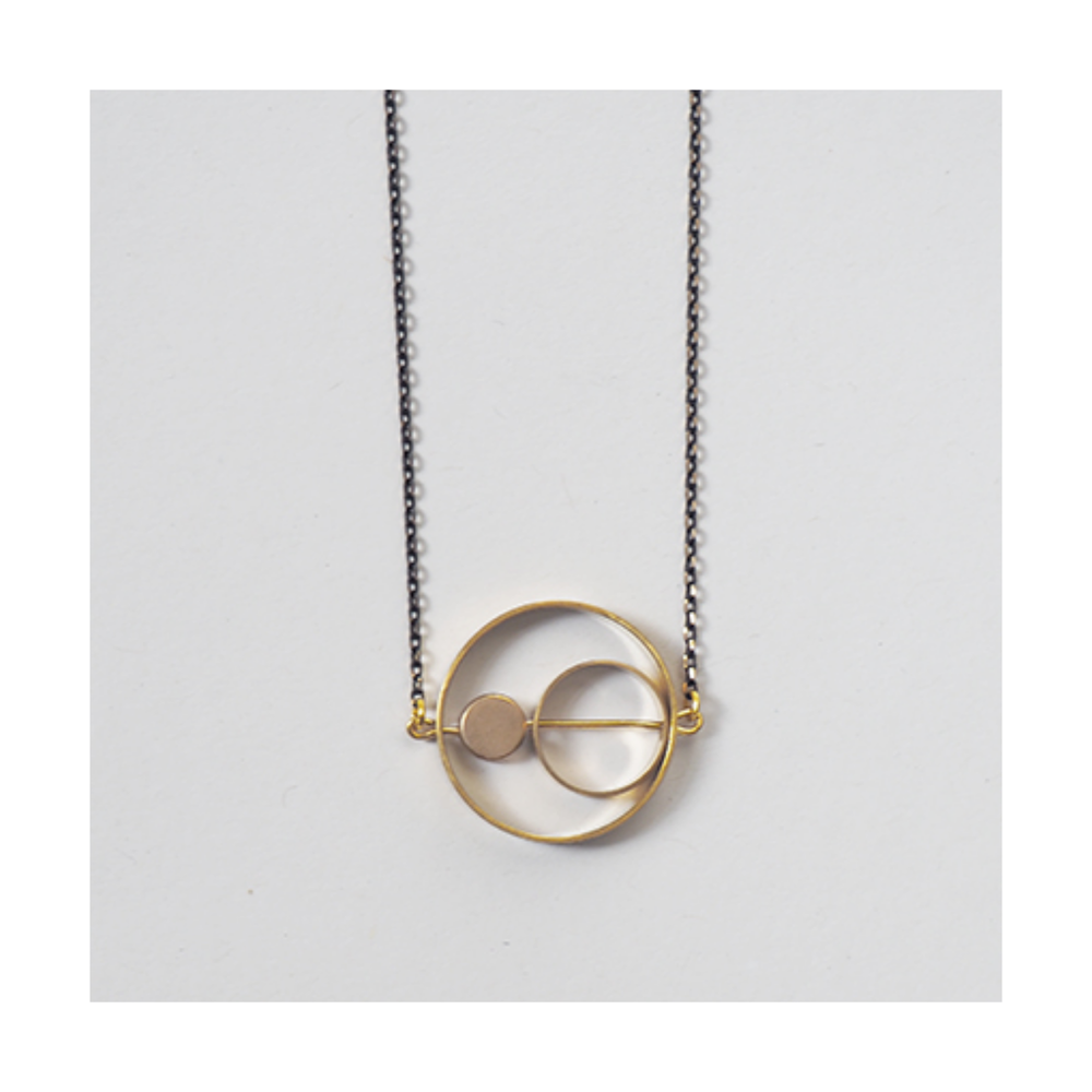 
                  
                    Brass Rings Necklace
                  
                