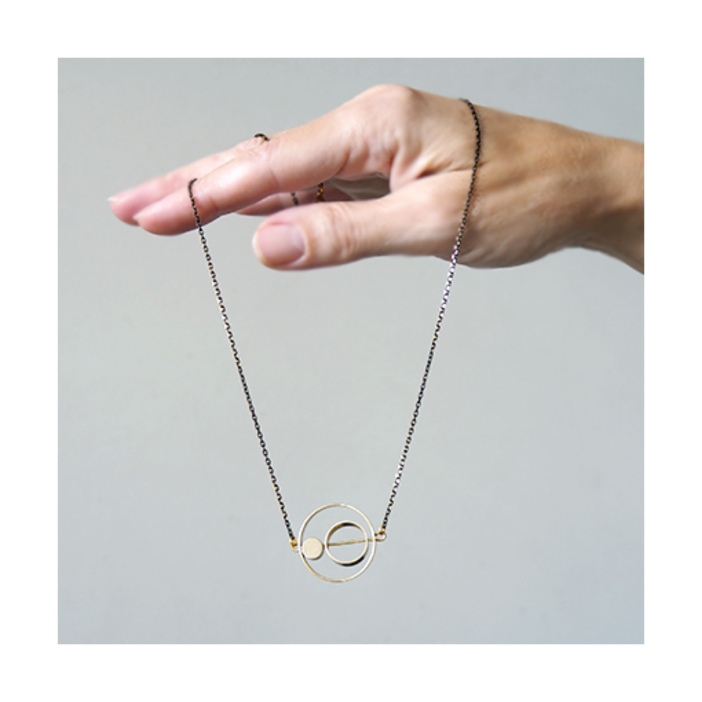 
                  
                    Brass Rings Necklace
                  
                