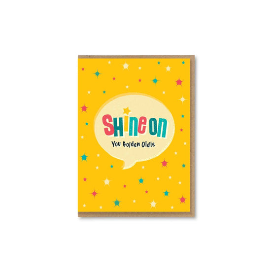 A retro typographic birthday card by The Typecast Gallery. It features the phrase "Shine on you Golden Oldie" in a colourful, retro style. A cheeky greeting that's the perfect way to say happy birthday for the older gent.