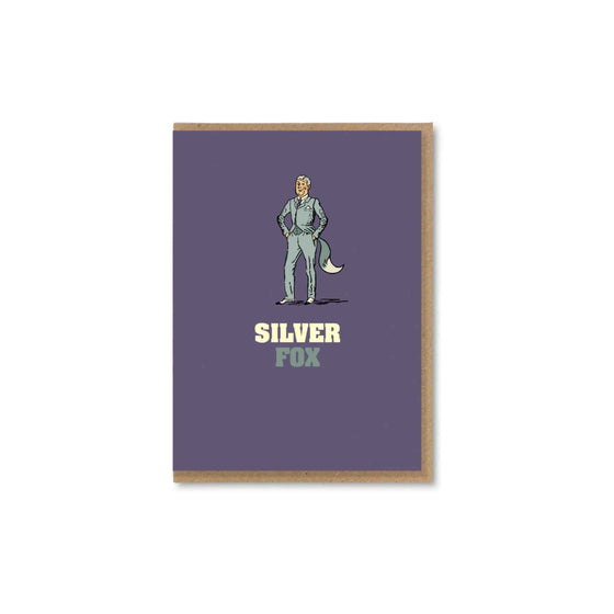 A bold, quirky illustrated card by The Typecast Gallery. It features a vintage-style illustration of a man in silver with a fox tail, above the words "Silver Fox". It's like sending a cheeky wink.&nbsp;
