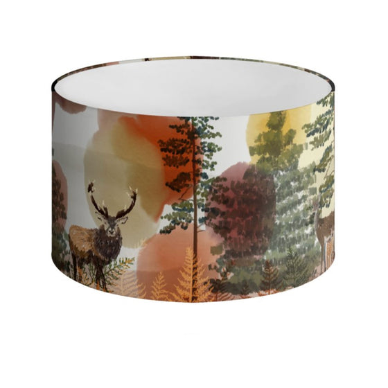 An illustrated lampshade featuring a woodland scene with stags by Tori Gray / Harbour Lane Studio